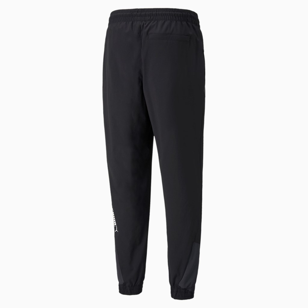 Black Puma PUMA International Winterized Woven Men's Pants | 4970SUCFI