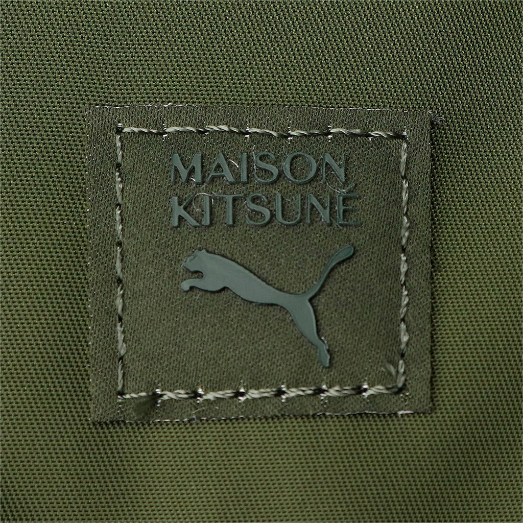 Rifle Green Puma PUMA x MAISON KITSUNE Rolltop Women's Backpack | 3274RAUES